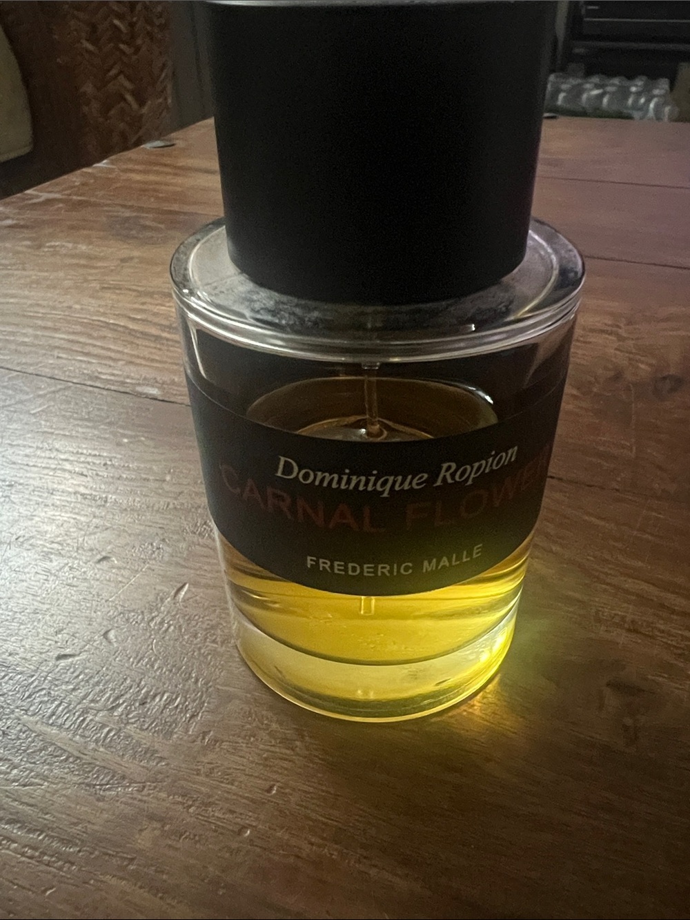 Dominique Ropion Carnal Flower Bottle - Black Cap with Yellow Liquid